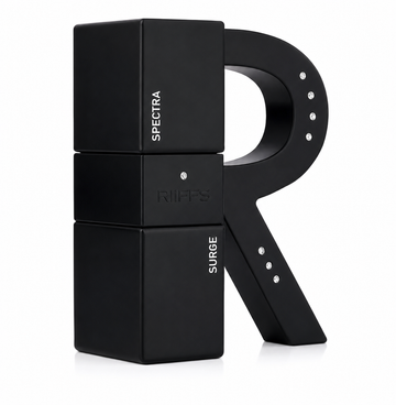 Riiffs Spectra Surge fragrance bottle with a unique matte black design shaped around a large stylized letter "R" accented by small crystal details, shown on a white background.