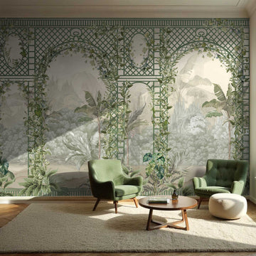 Arched mural with intricate lattice, ivy vines, and lush greenery adorns a sunlit wall behind green armchairs and a round wooden table.
